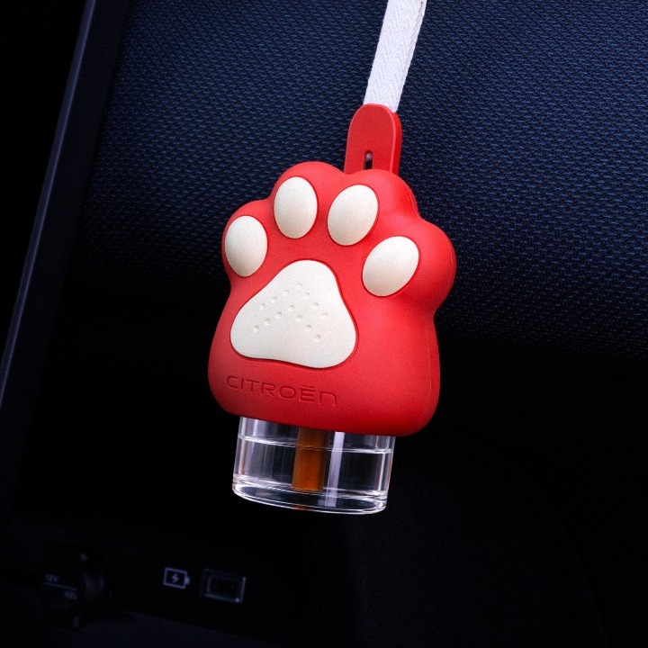 El dispositivo que tiene forma de huella roja y blanca