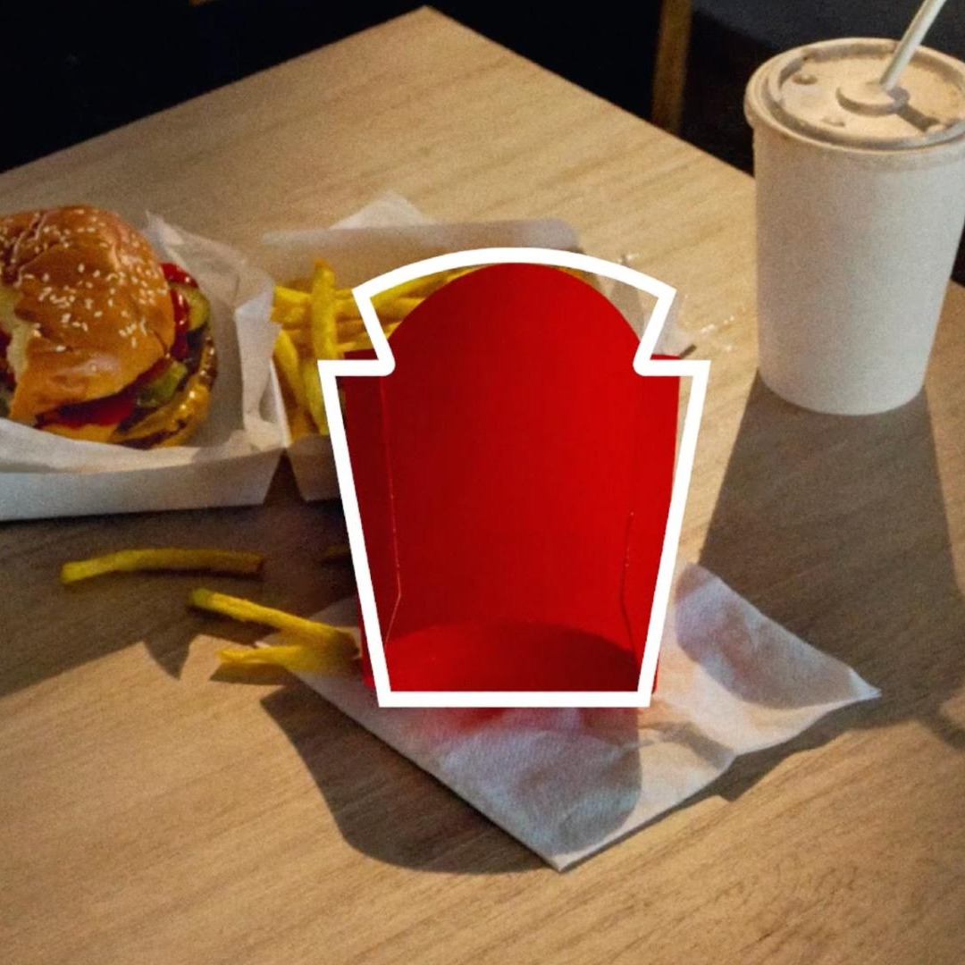 Silueta del logotipo de Heinz sobre caja de patatas fritas