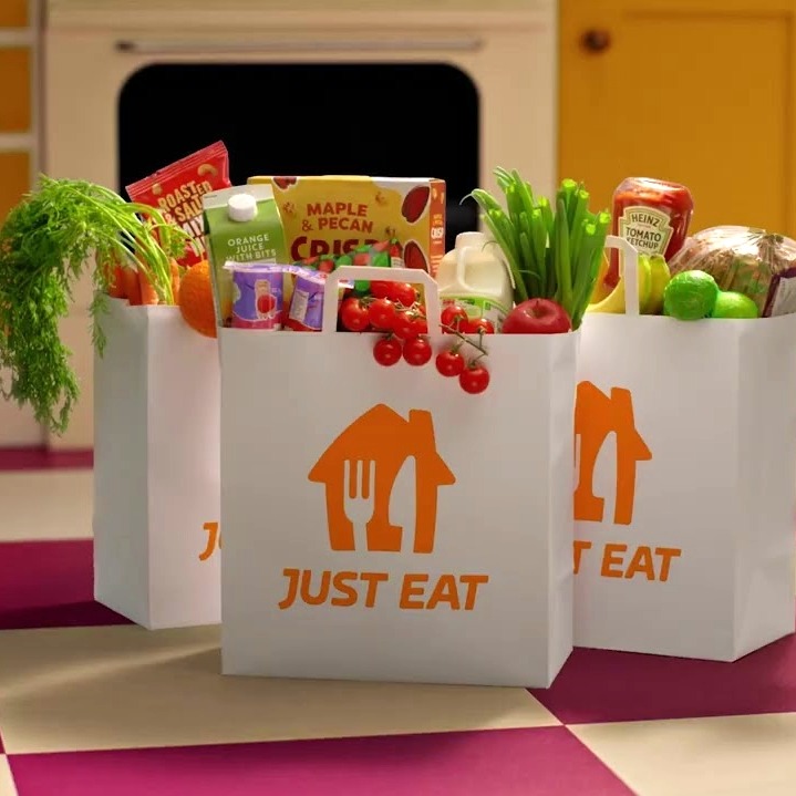 Unas bolsas de Jus Eat con verduras y comida dentro