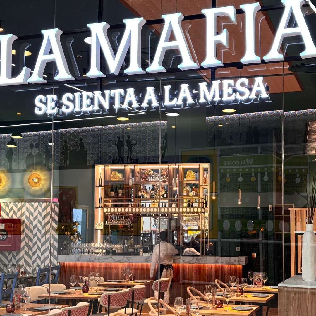 Restaurante de La Mafia Se Sienta a la Mesa