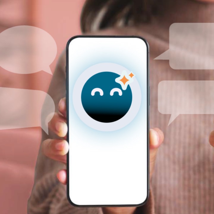 Una pantalla mostrando el icono de Guio y una mano haciendo el gesto de ok