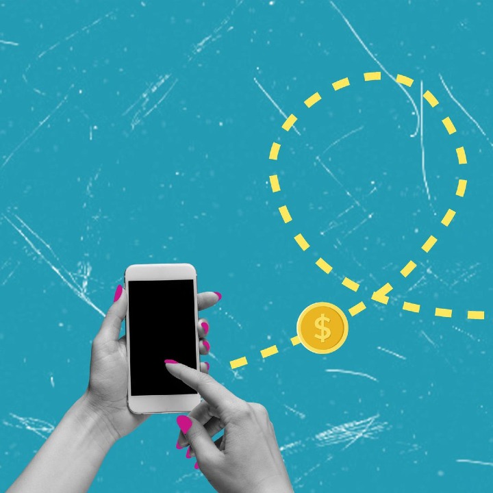 un símbolo de dólar viaja de un smartphone a otro
