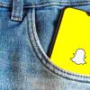 Móvil con Snapchar en el bolsillo de un pantalón vaquero