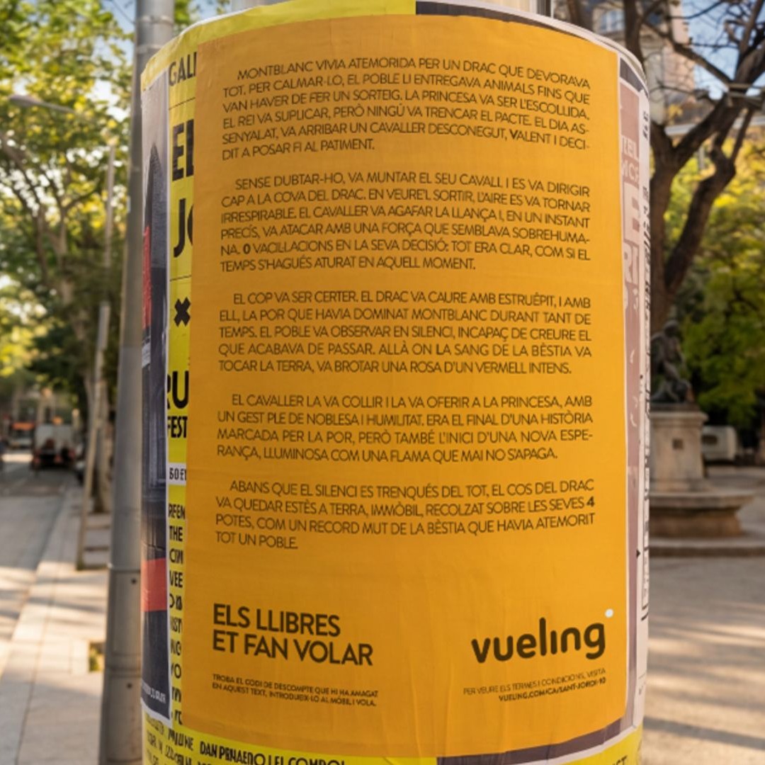 Cartel publicitario de Vueling por Sant Jordi
