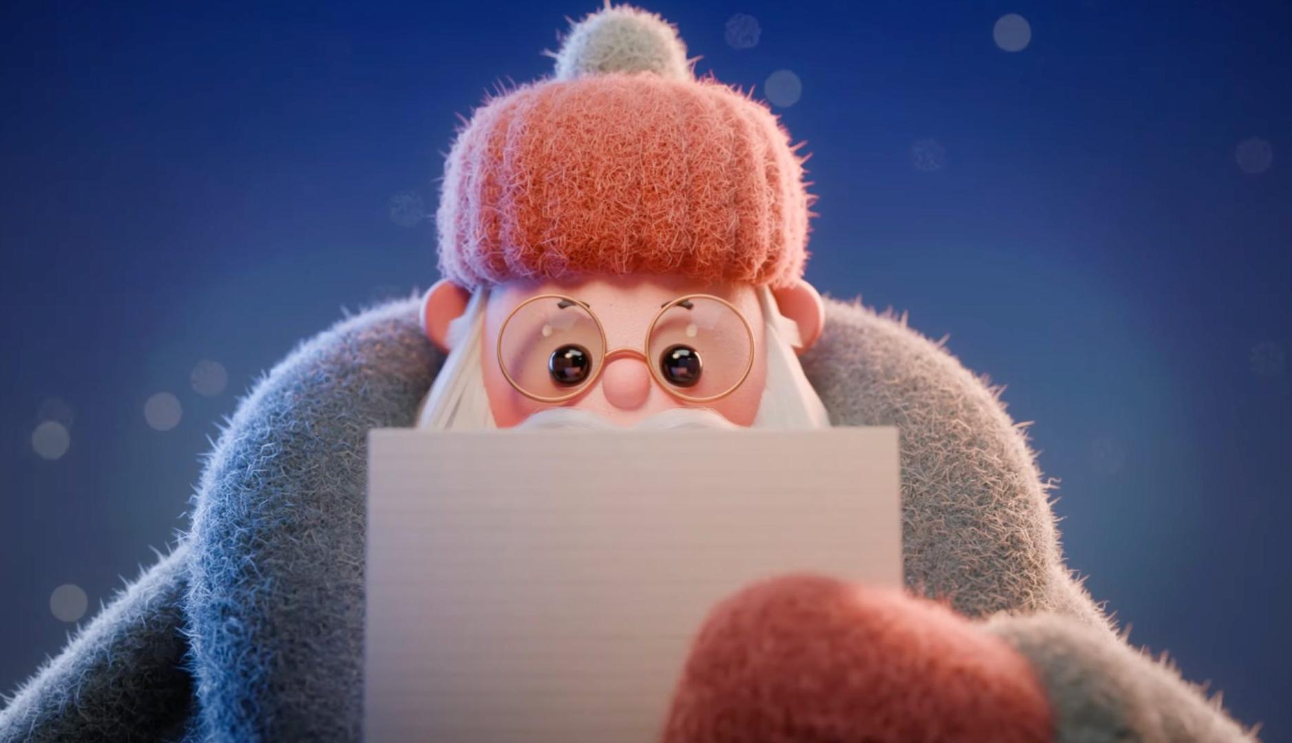 Un Papá Noel animado lee una carta