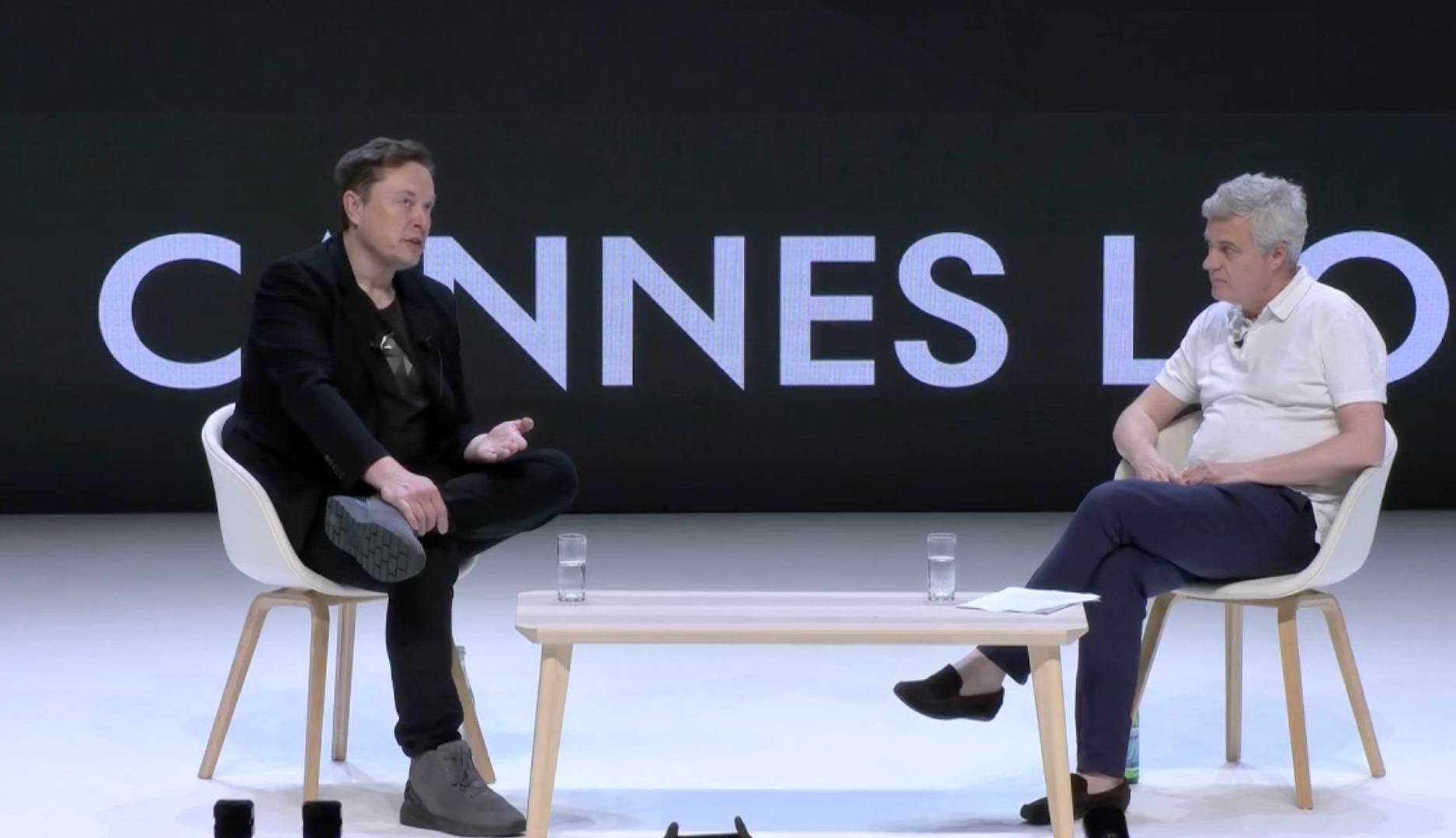 Elon Musk y Mark Read