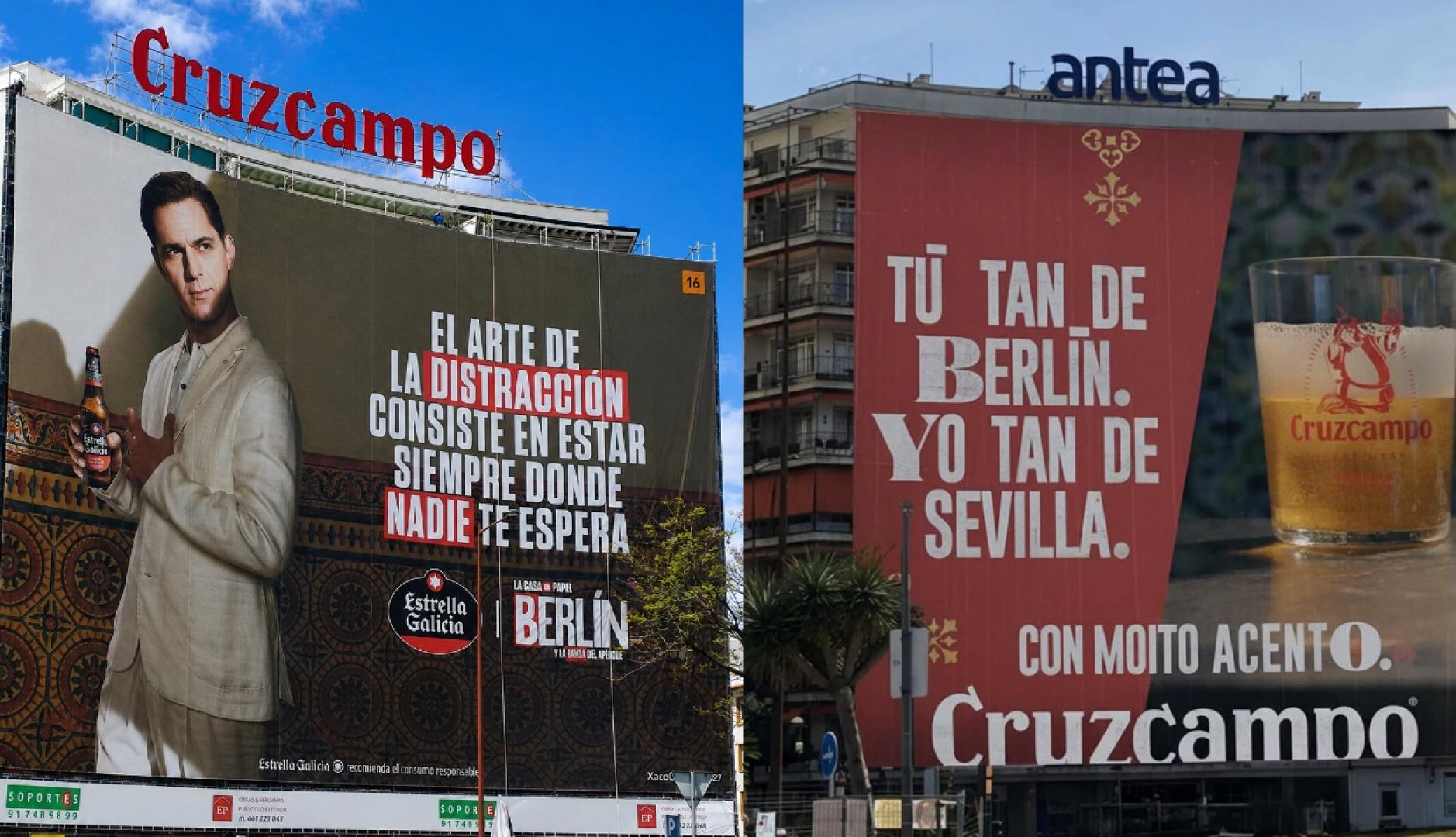 La lona de Estrella Galicia con Berlín y al lado la de Cruzcampo respondiendo