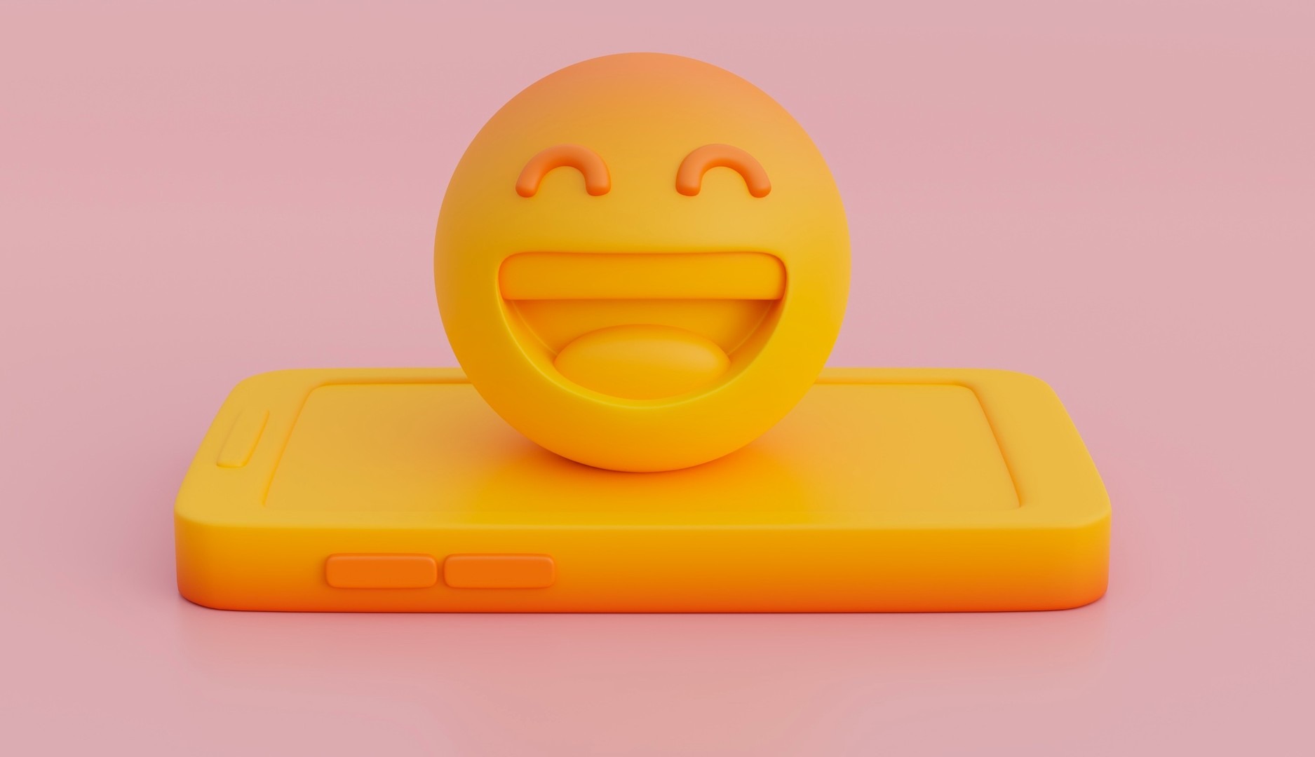 Emoji de risa sobre un teléfono móvil