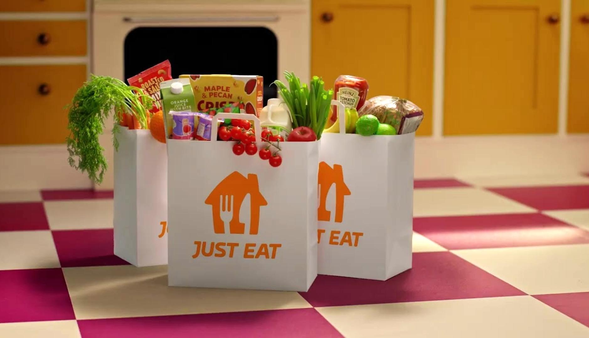 Unas bolsas de Jus Eat con verduras y comida dentro