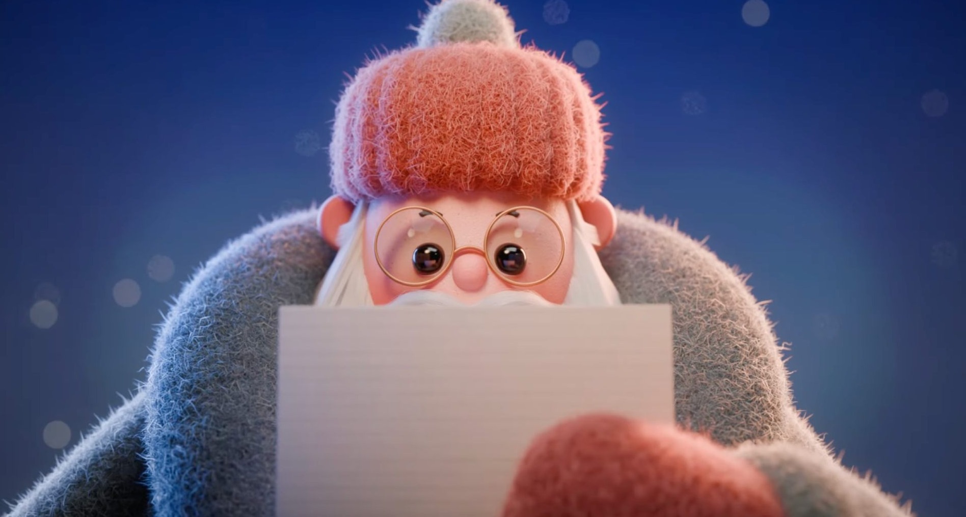 Un Papá Noel animado lee una carta