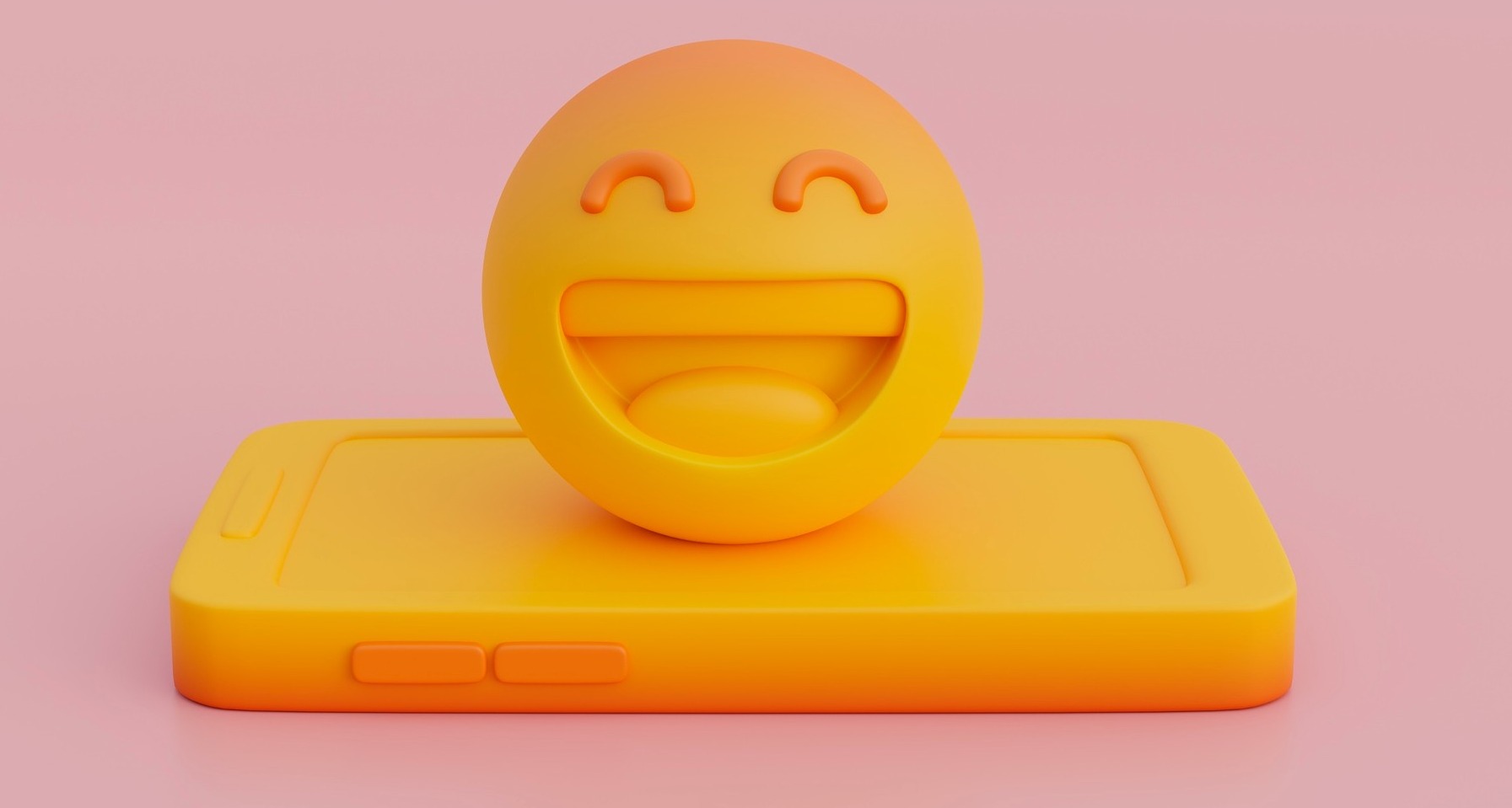 Emoji de risa sobre un teléfono móvil