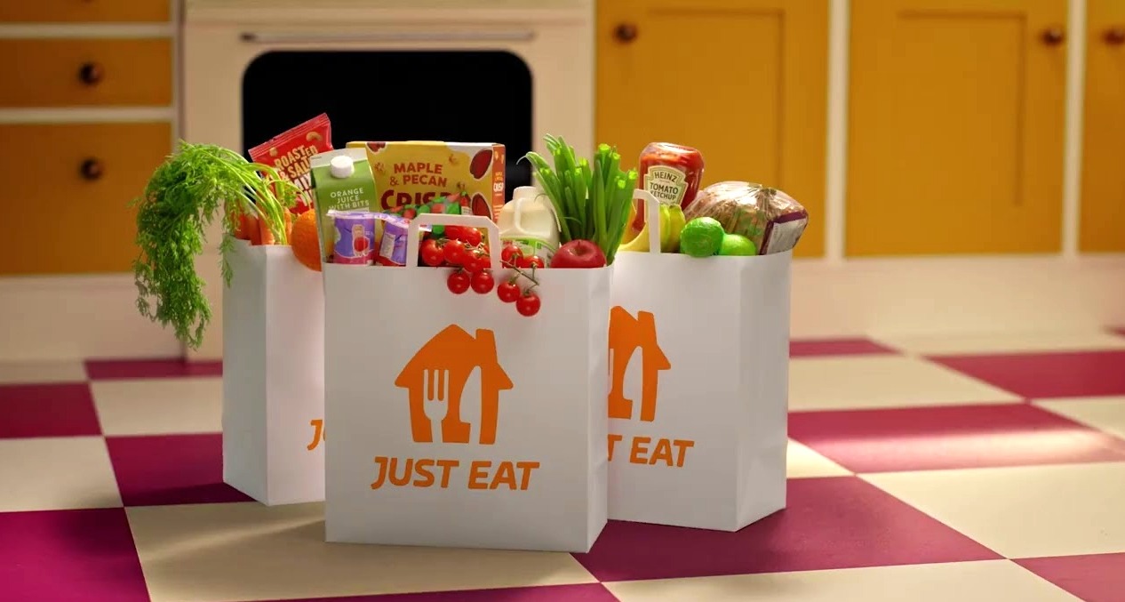 Unas bolsas de Jus Eat con verduras y comida dentro