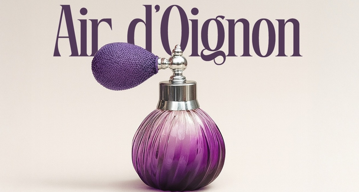 el frasco de perfume de cebolla que es morado con forma de cebolla
