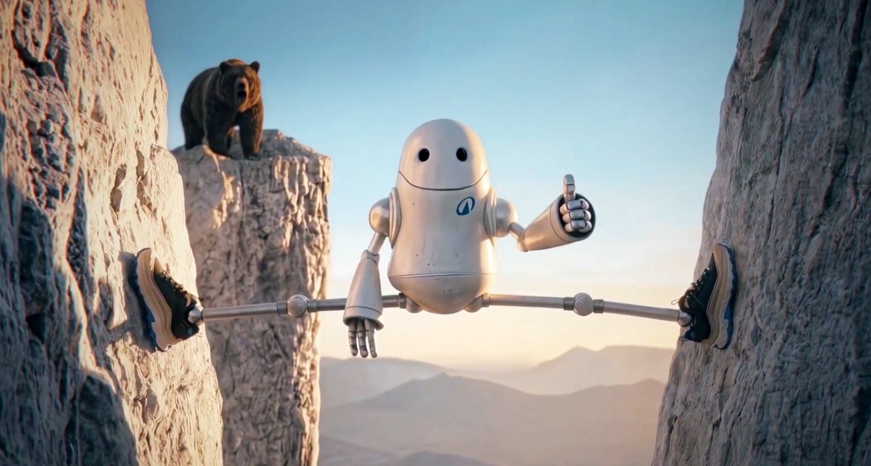 El robot abierto de piernas entre dos rocas huyendo de un oso