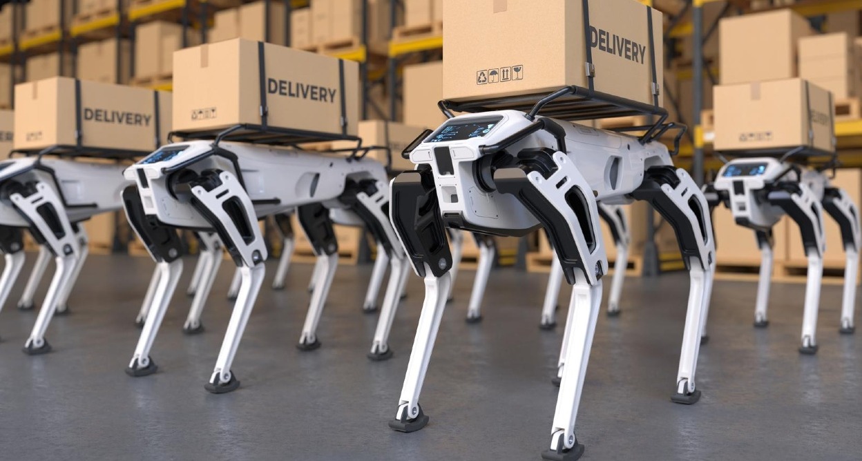 Robots en un almacén portando cajas de delivery