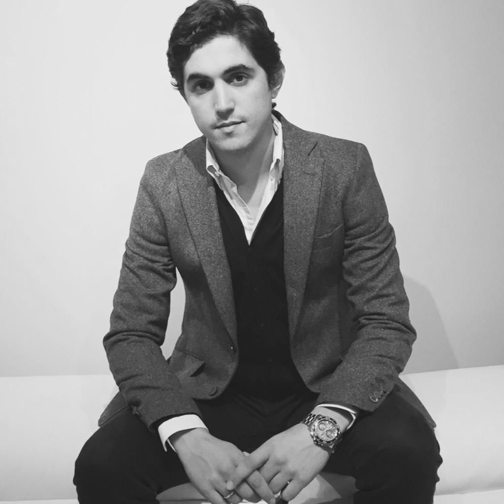 Dress shirt, Flash photography, Arm, Watch, Shoulder, Black, Neck, Sleeve, Standing, Gesture