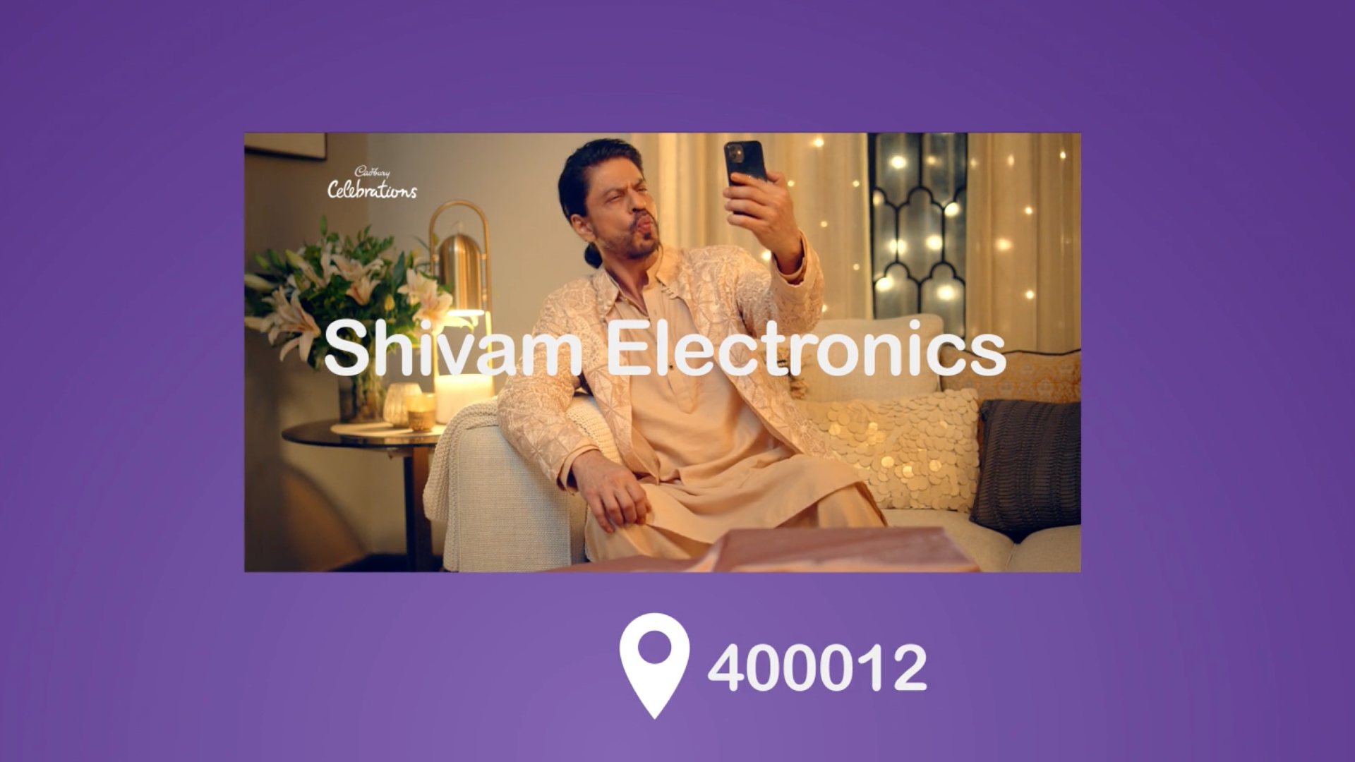 Shah Rukh Khan en el vídeo de la campaña con el nombre sobreimpresionado de uno de los negocios locales.