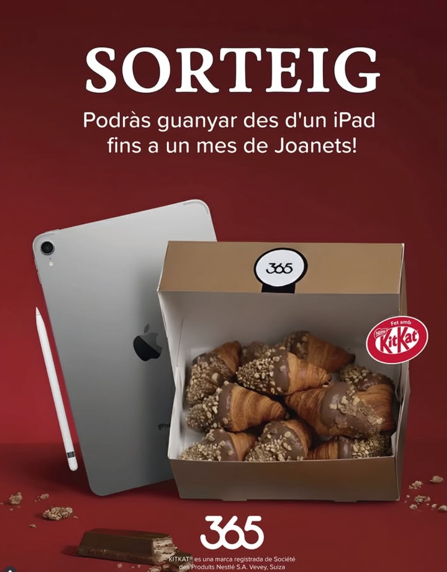 Una caja de minicroissants junto a un iPad